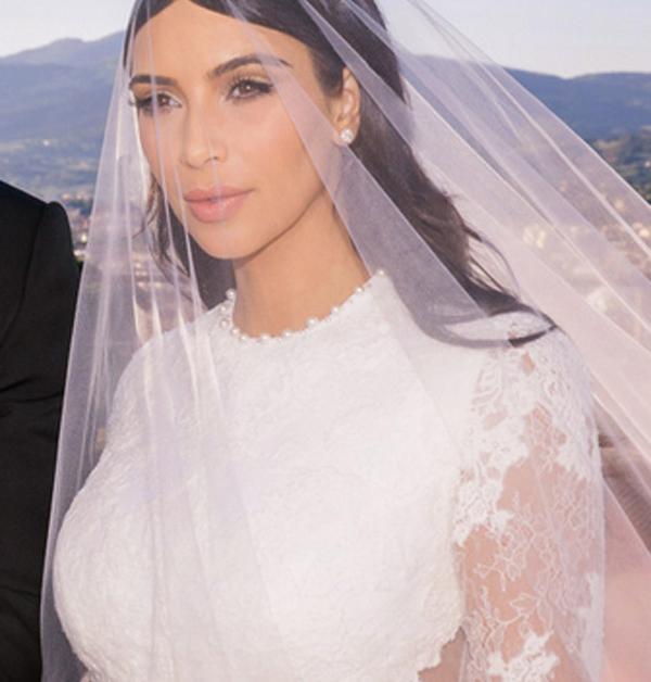 Kim Kardashian long glossy wedding hair