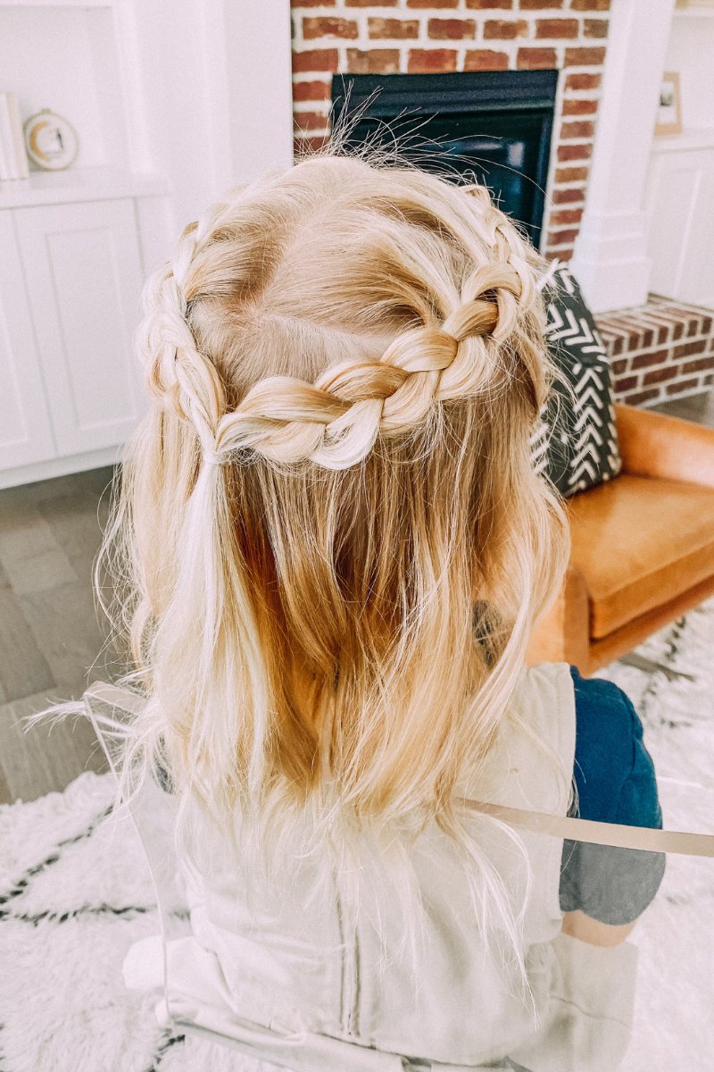 Little girl wearing a neat crown braid around her head
