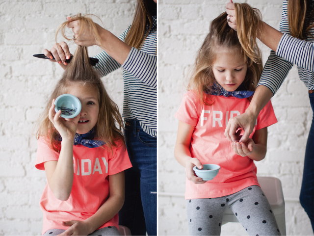 Little girl sporting a cute half-up top knot hairstyle
