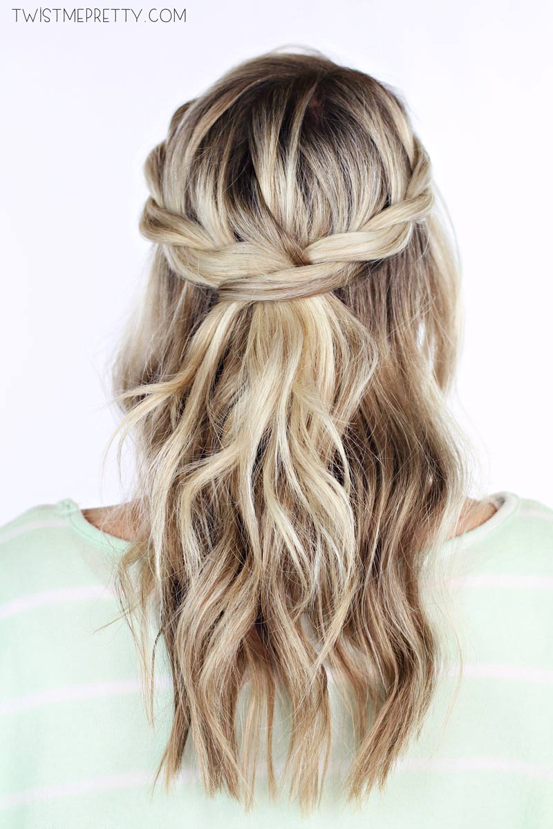 Little girl with a romantic twisted half-up crown hairstyle