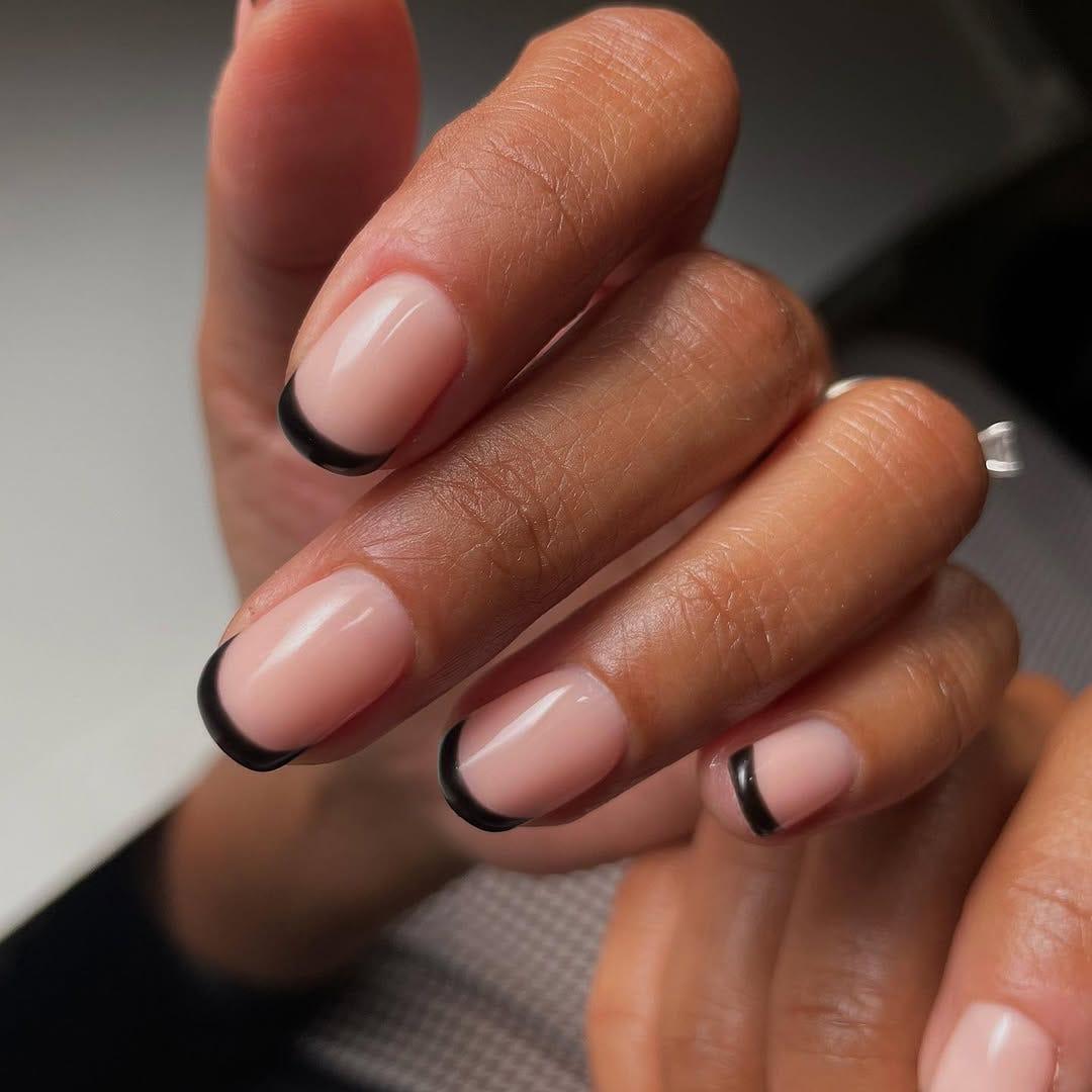 Black French tip manicure