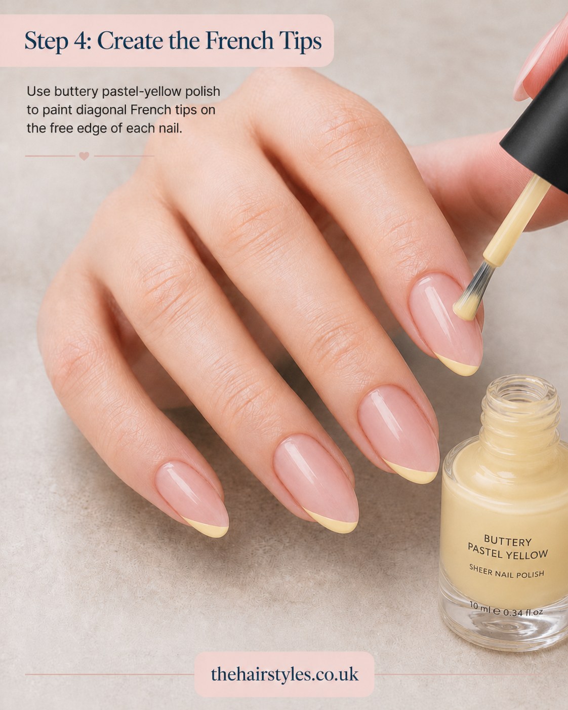 Using buttery pastel-yellow polish to paint diagonal French tips for blueberry French tip nails