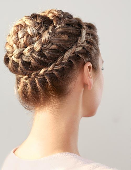 Braided updo hairstyle with intricate plaits