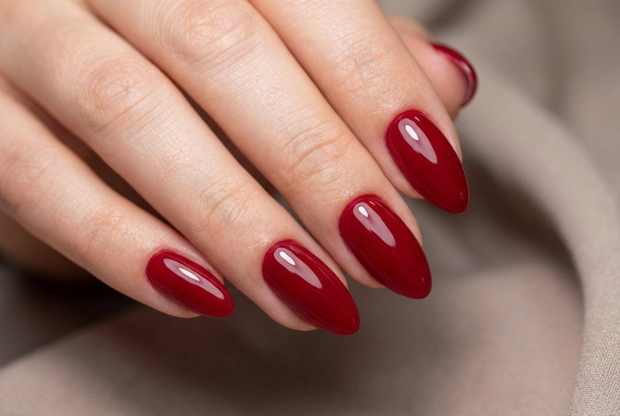 Cherry red glossy glam nails