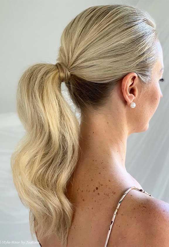 Chic ponytail wedding guest hairstyle