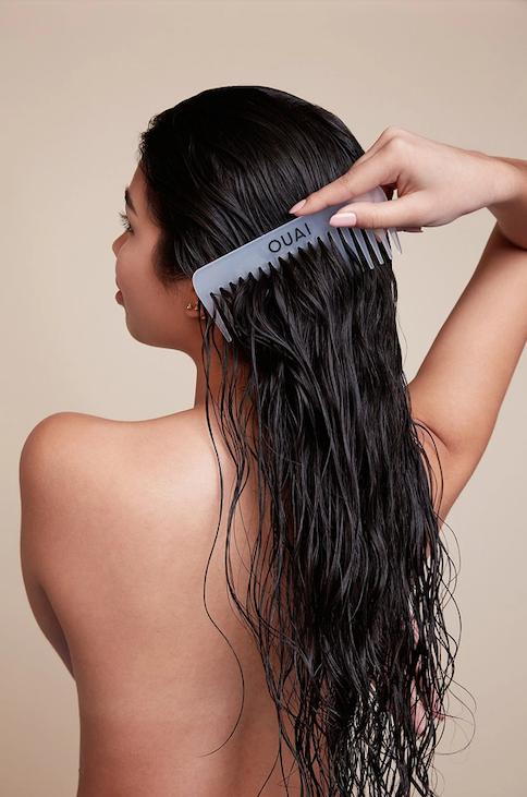 Wide tooth comb detangling long hair