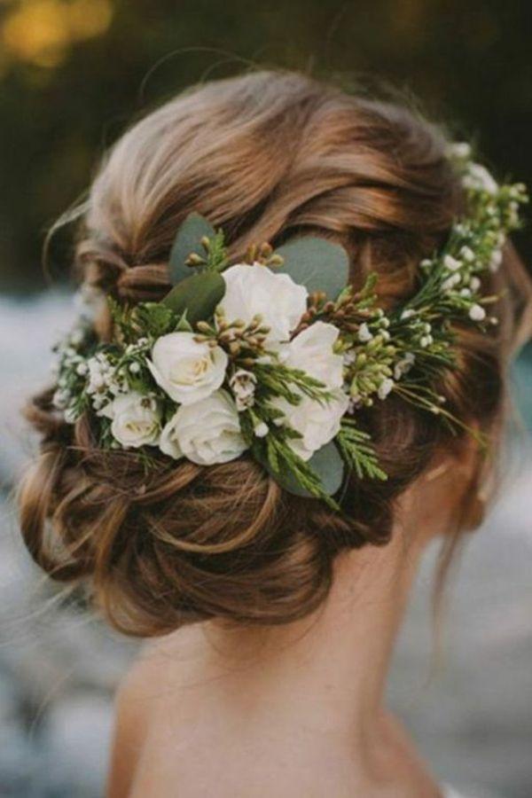 Floral wedding updo with hair flowers