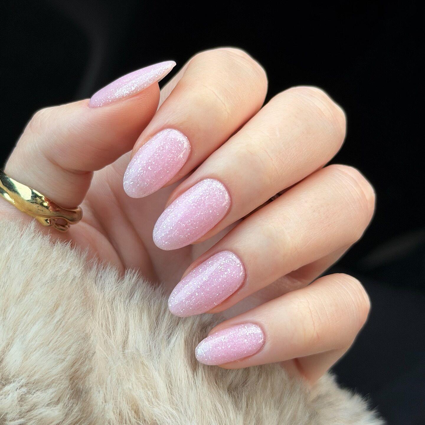 Glittery baby pink celebrity inspired manicure