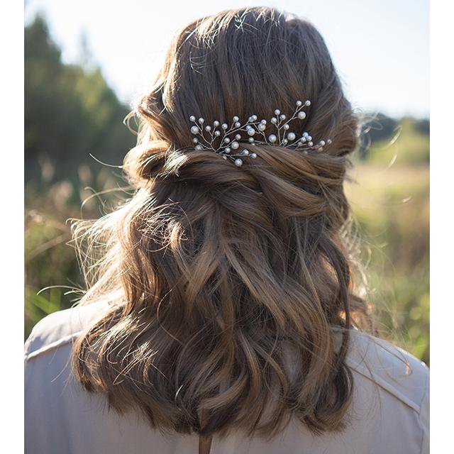 Pearl accessory wedding hairstyle