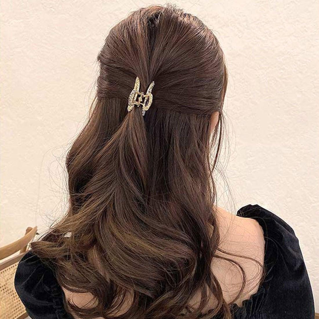 Half-up hairstyle with hair clip