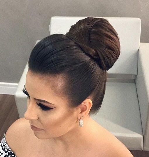 High bun hairstyle with modern volume