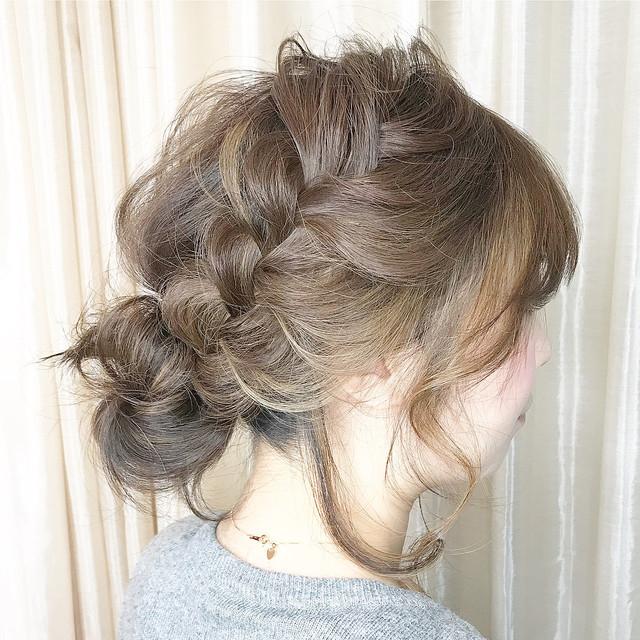 Loose bun with braided details