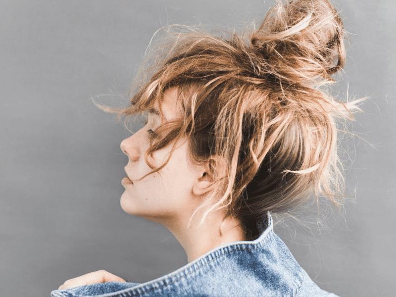 Messy bun hairstyle for medium hair