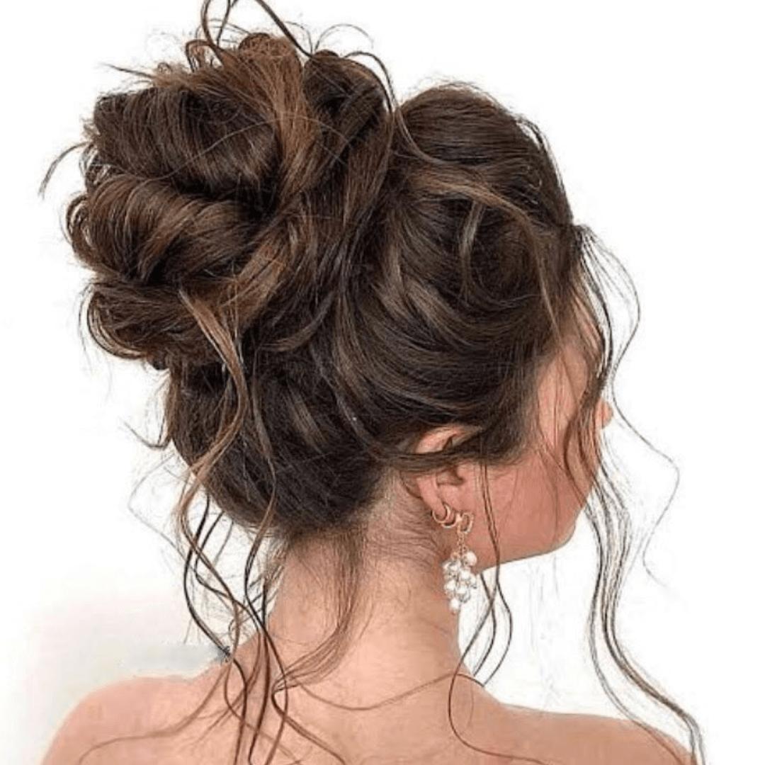 Messy bun updo with relaxed texture