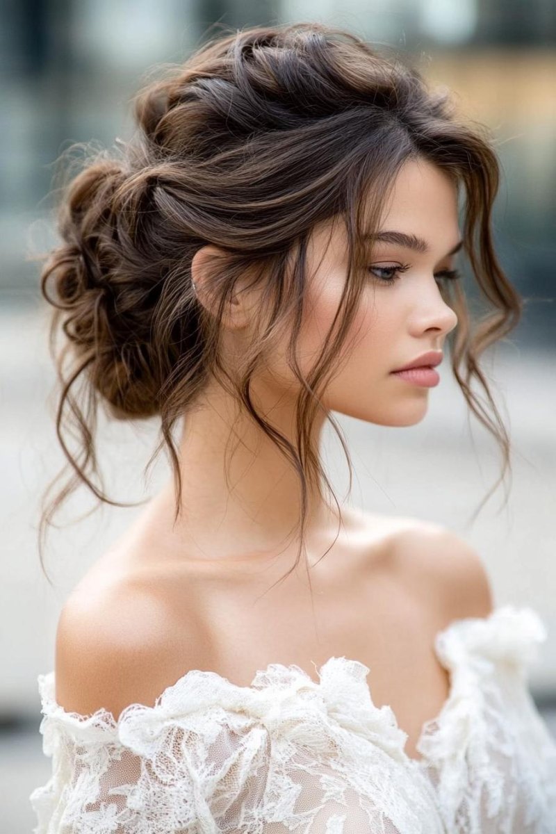 Boho bride with messy textured updo