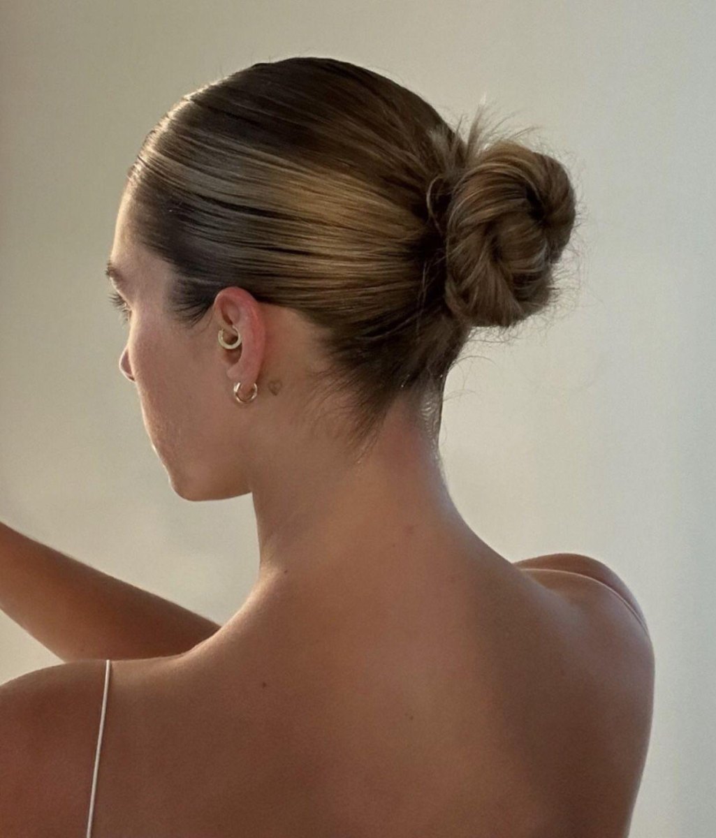 Minimalist loose bun look