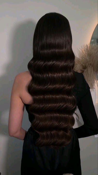 Long dark Hollywood wave hairstyle