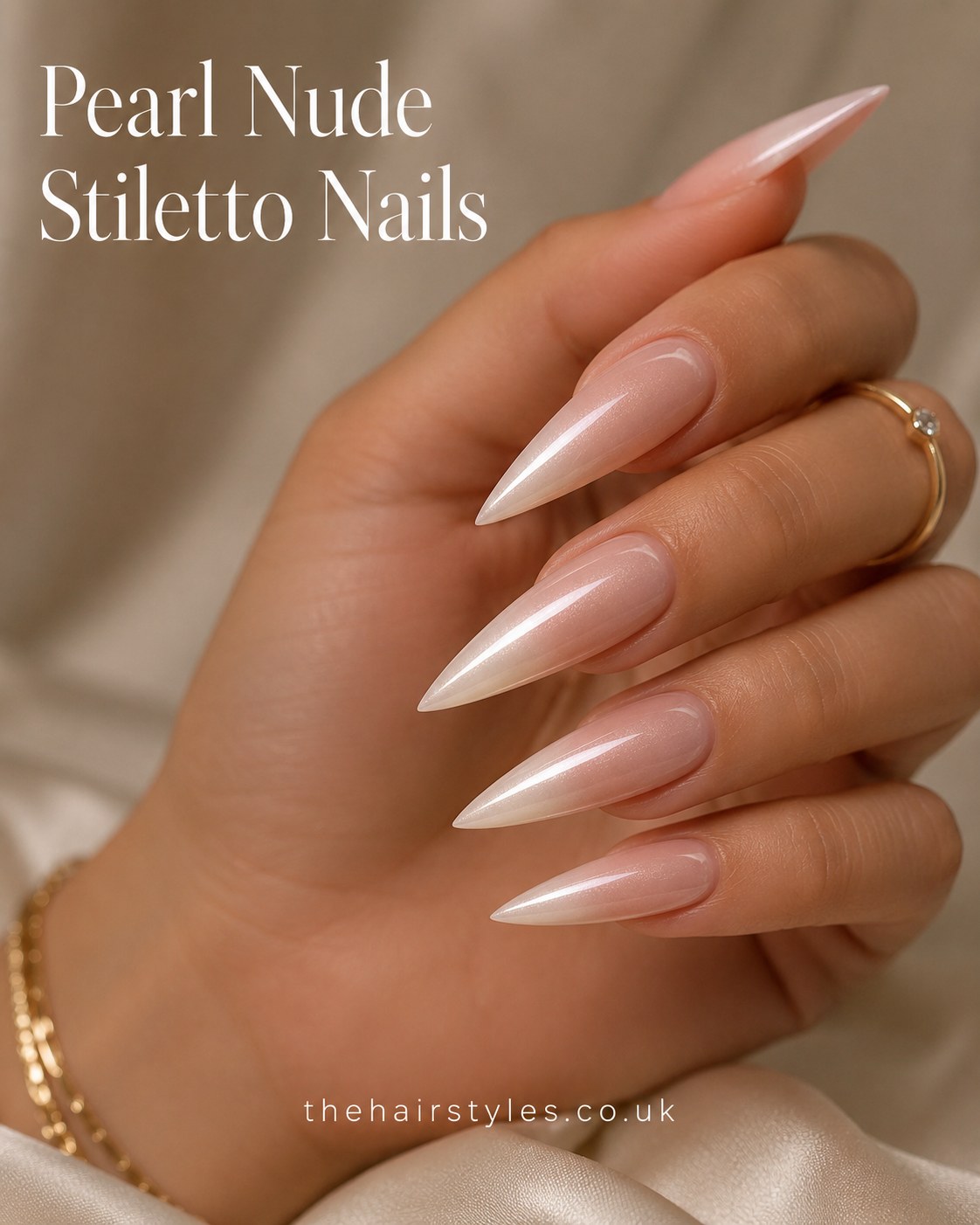 Pearl nude stiletto nails with a soft shimmering ombré finish for elegant pastel nails