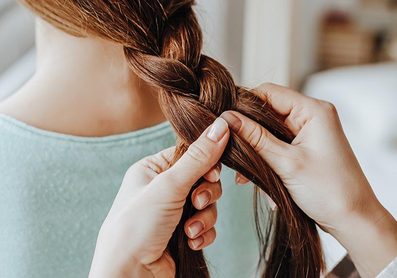 Practising hair braiding skills