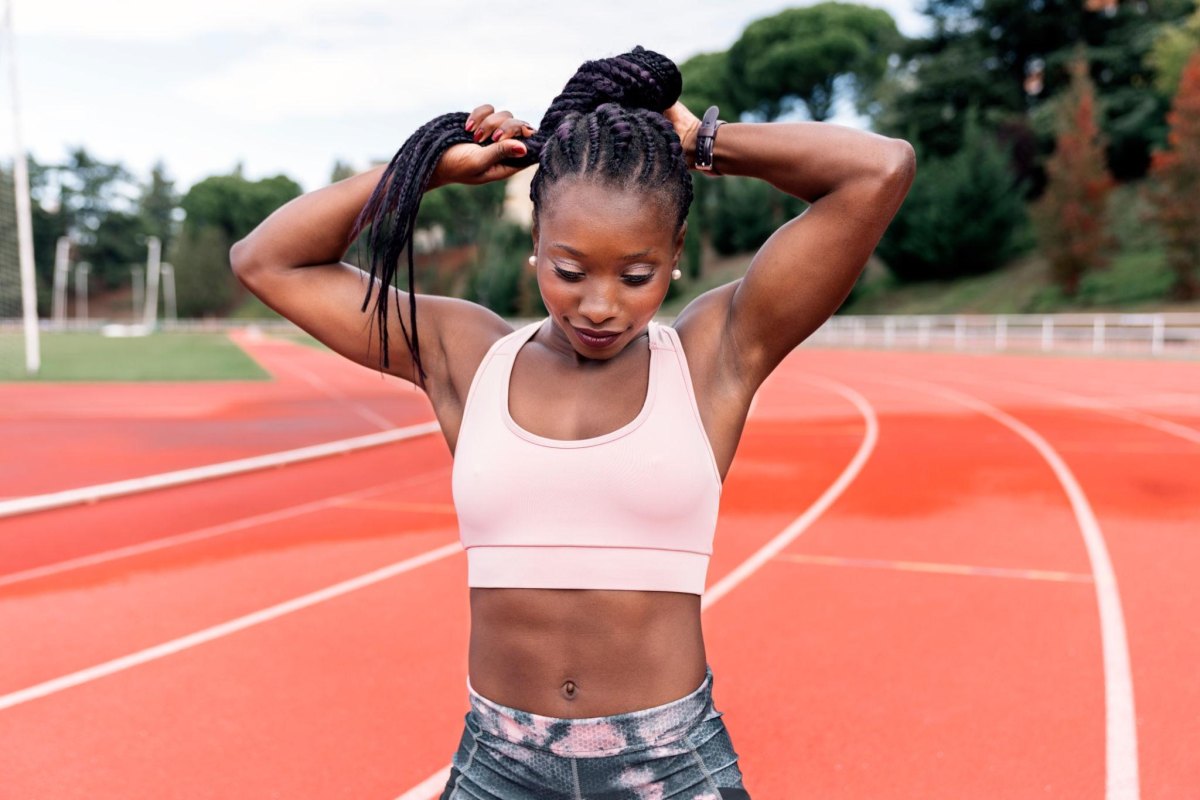 Woman with protective sports hairstyle