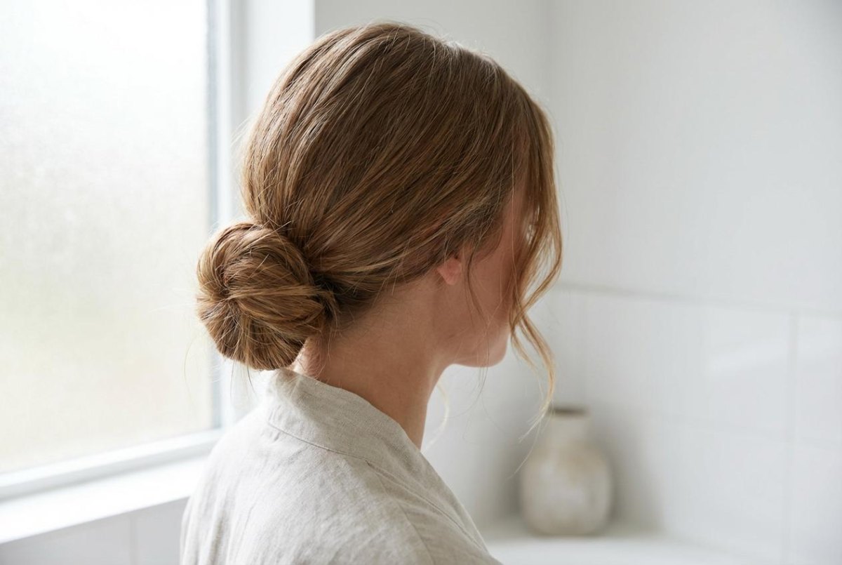 Woman wearing quick low bun hairstyle