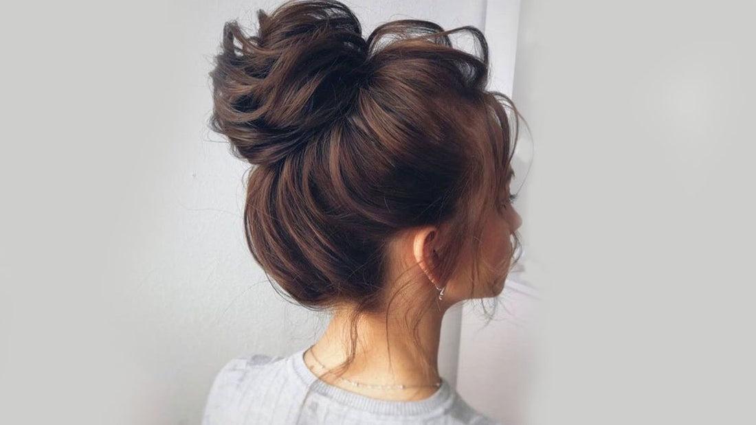 Messy bun hairstyle for long hair