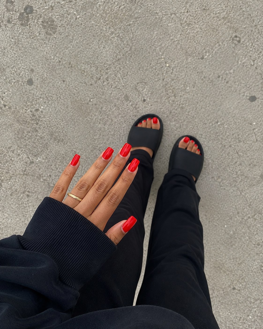 Classic red square nails paired with sandals, a timeless nail color for dark skin