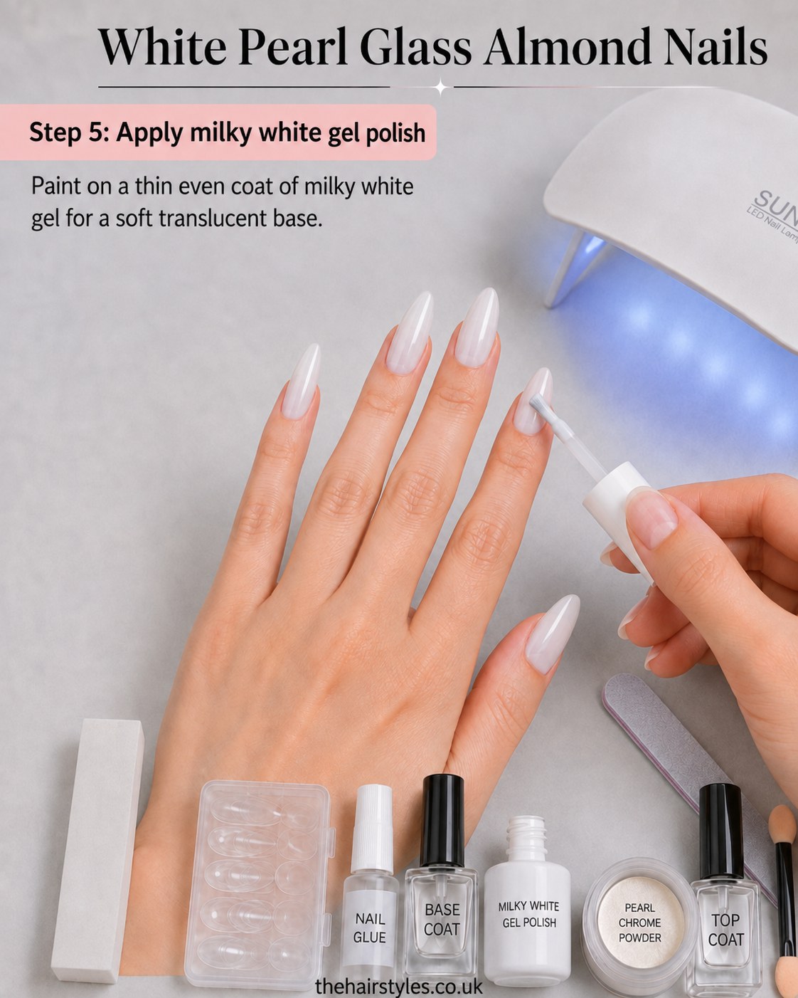 Painting milky white gel polish onto almond nails for the soft base of white pearl glass almond nails