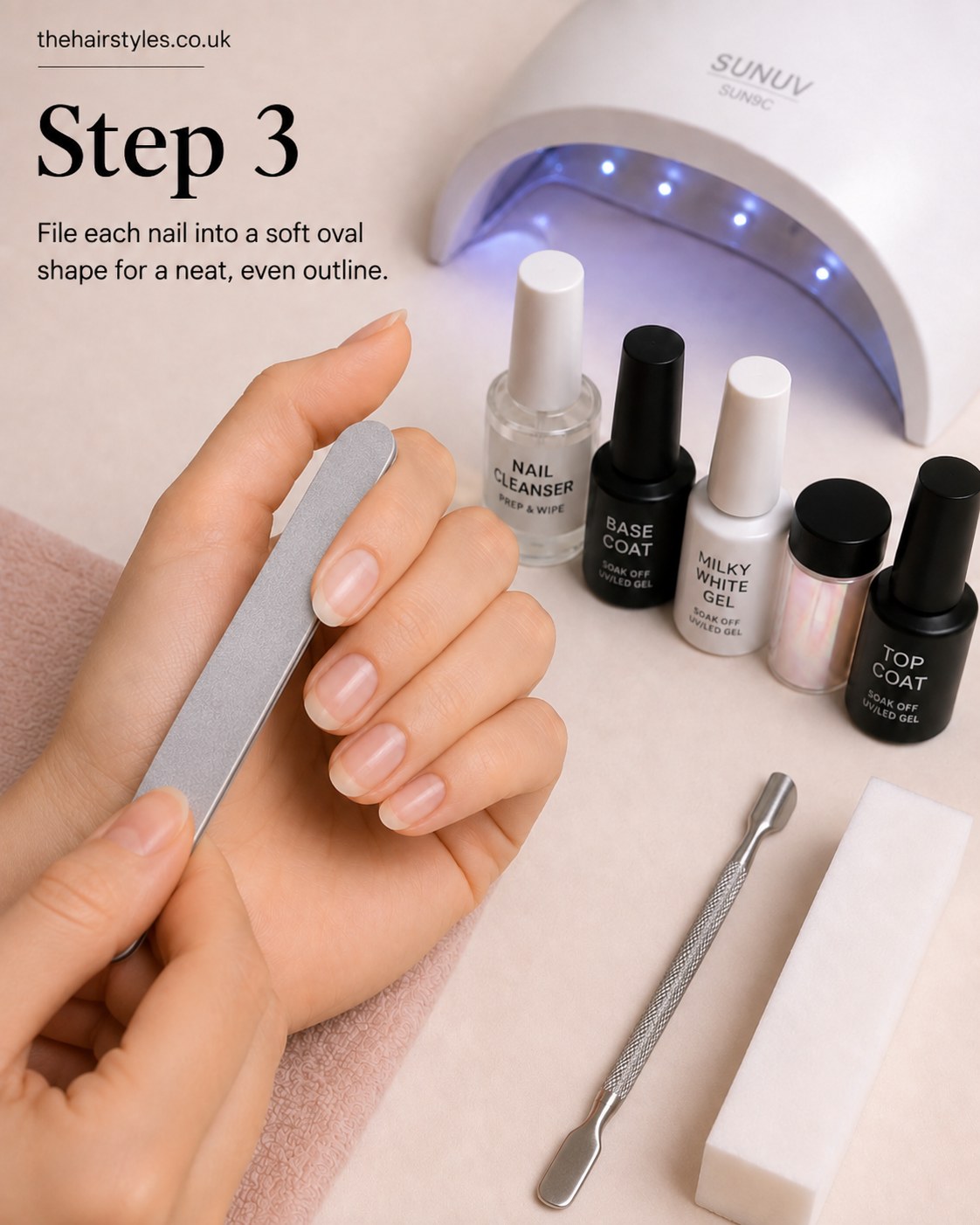 Filing each nail into a soft oval shape ahead of the white pearl glass nails finish